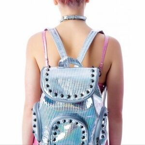 Looking for Everland Clothing holographic backpack